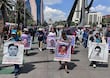 Conmemoran con marcha 11 aniversario de la desaparición de los 43 de Ayotzinapa