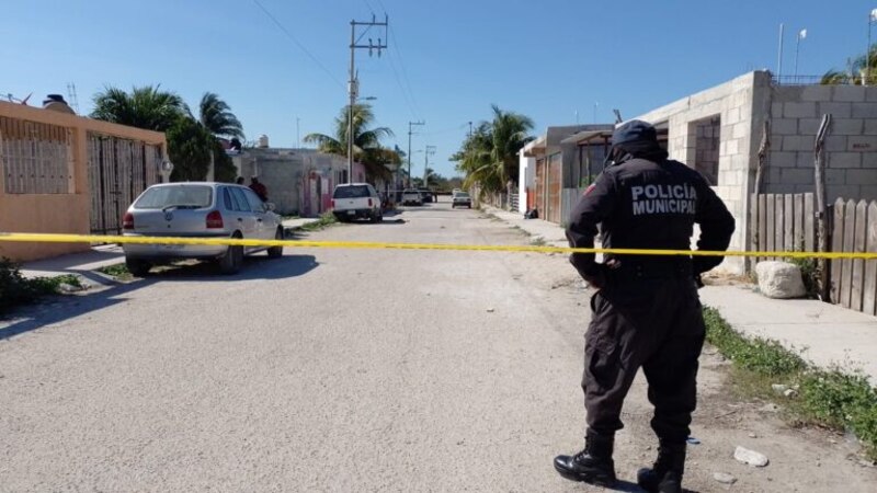 Policía investiga escena del crimen