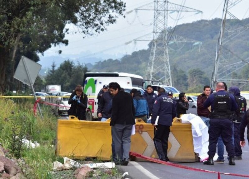 Levantamiento de un cuerpo en una carretera