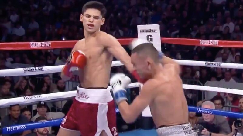 Pelea de box entre dos hombres jóvenes