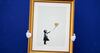Óleo de Banksy con su icónica ‘Niña con globo’ se subastará a partir de 13 millones