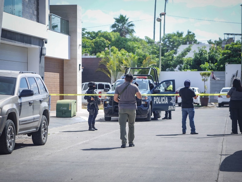 Policía investiga escena del crimen