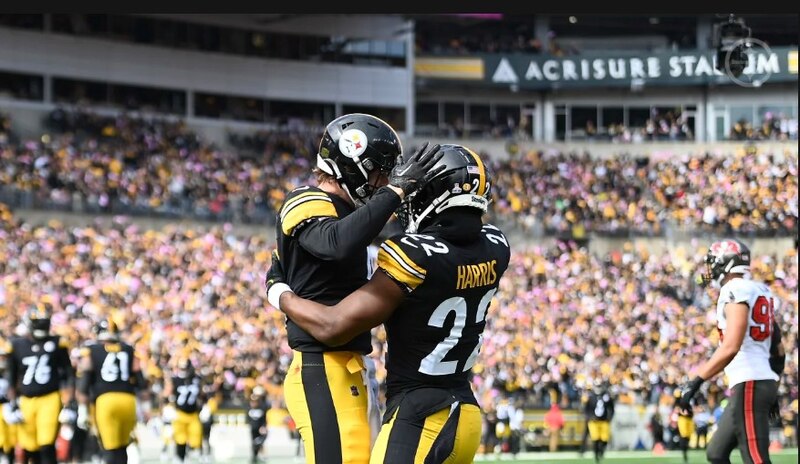 Jugadores de los Steelers celebran un touchdown