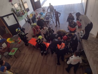 Rescatan con vida a dos personas intoxicadas al interior de una cisterna en Texcoco