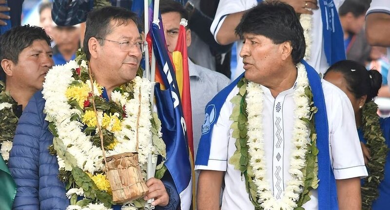 Evo Morales y Rafael Correa juntos en un evento público