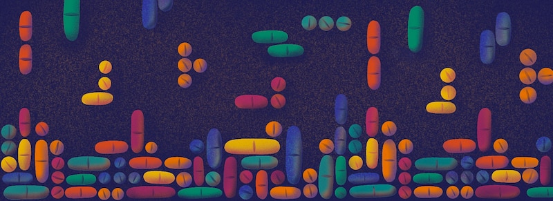 Pastillas de colores sobre un fondo oscuro