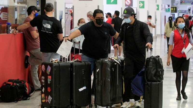 Pasajeros en el aeropuerto