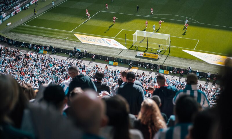 Aficionados en un partido de fútbol