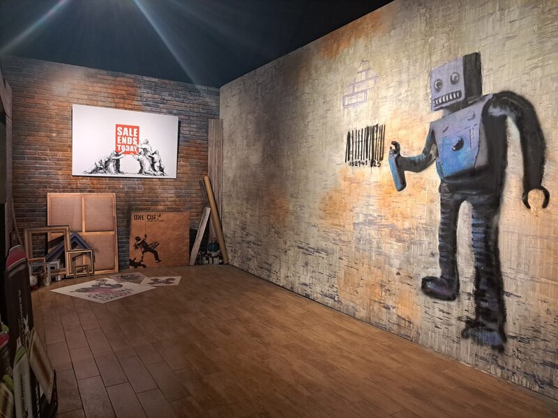 Banksy, el robot y la niña