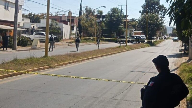Policía investiga escena del crimen