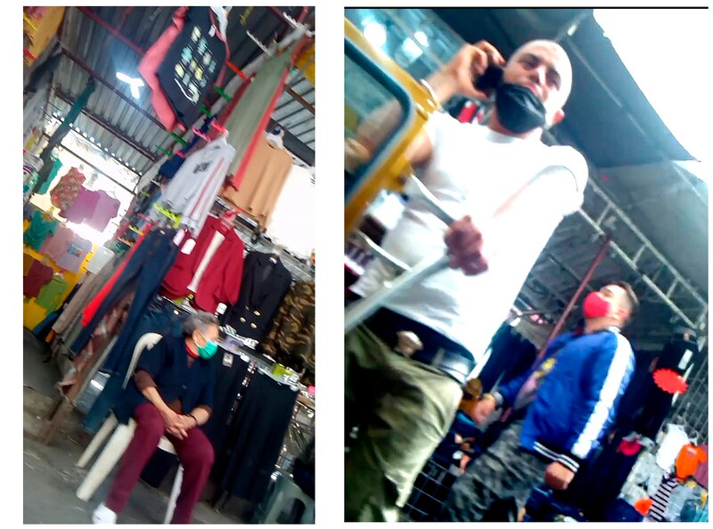 Hombre hablando por teléfono en un mercado