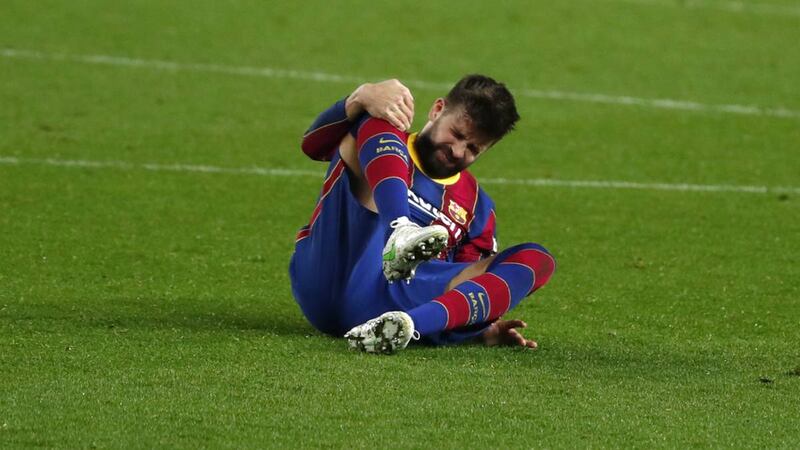 Piqué se lesiona en el partido contra el Atlético de Madrid