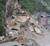 Alud de rocas y tierra en China sepulta 10 edificios