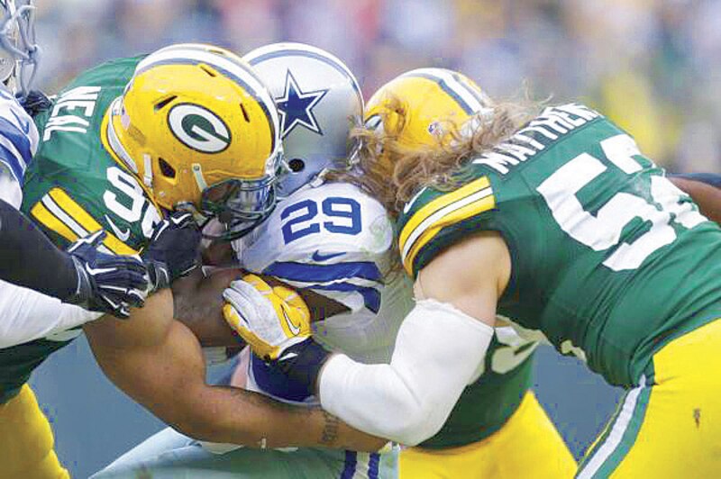 Partido de fútbol americano entre los Green Bay Packers y los Dallas Cowboys.