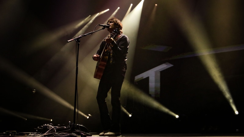 El cantante de rock alternativo, cantautor y músico, Ed Sheeran, en concierto.