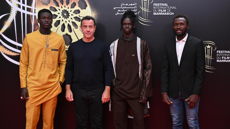 Actores y director en la alfombra roja del Festival Internacional de Cine de Marrakech