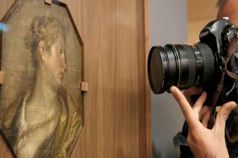 El fotógrafo y la obra de arte