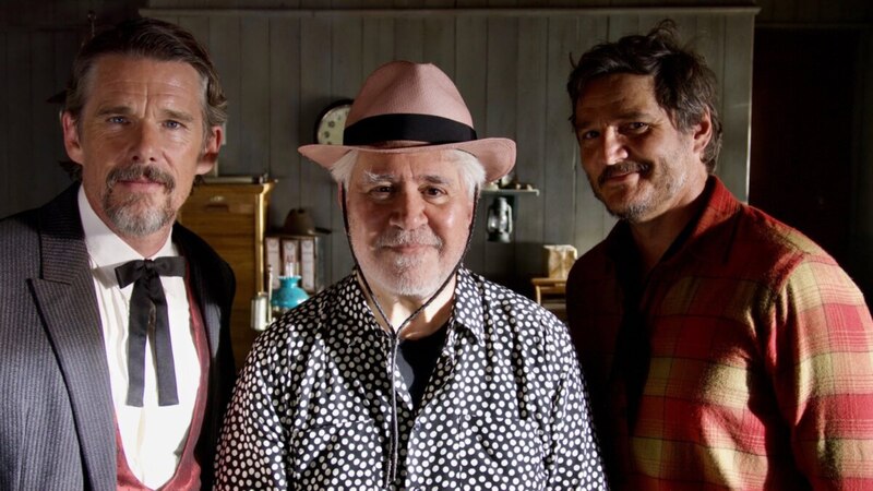 Tres hombres en un bar
