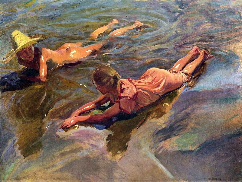 Dos mujeres bañándose en el río
