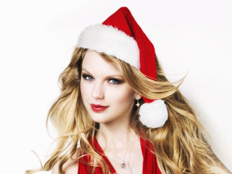 Taylor Swift con un gorro de Papá Noel