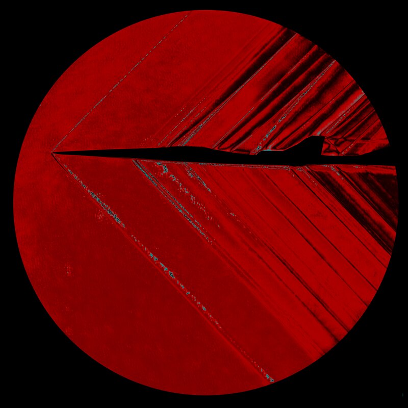 Círculo rojo con textura de metal