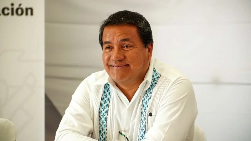 El presidente ecuatoriano Guillermo Lasso sonríe durante un evento público.