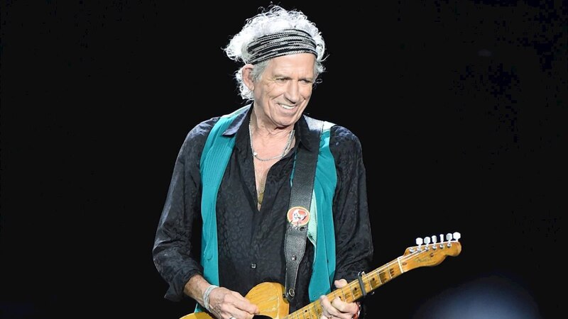Mick Jagger cantando en un concierto