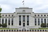 Fed anuncia baja de los tipos de interés en un cuarto de punto