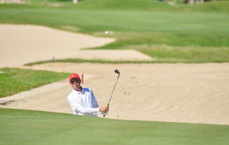 Golfista en bunker