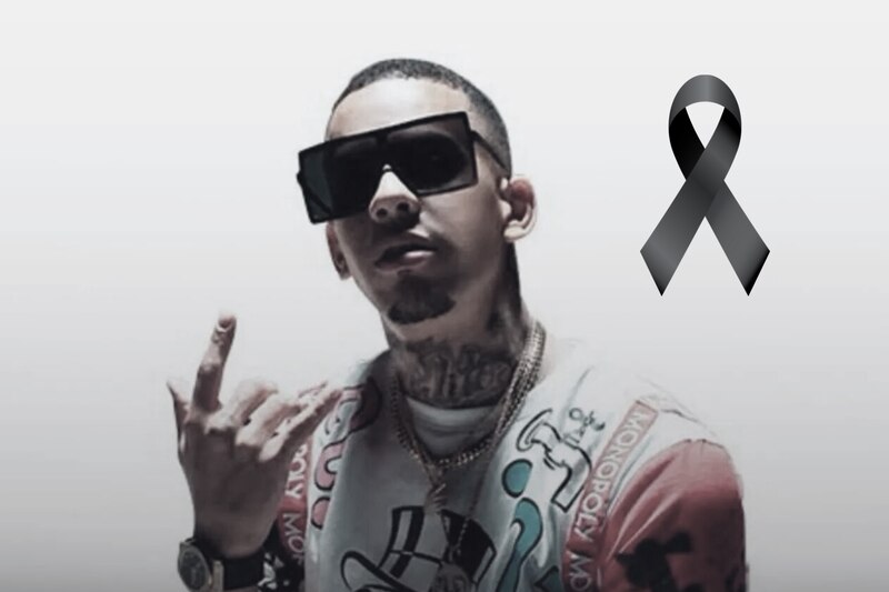 Fotografía del reggaetonero Marvel Boy con un moño negro