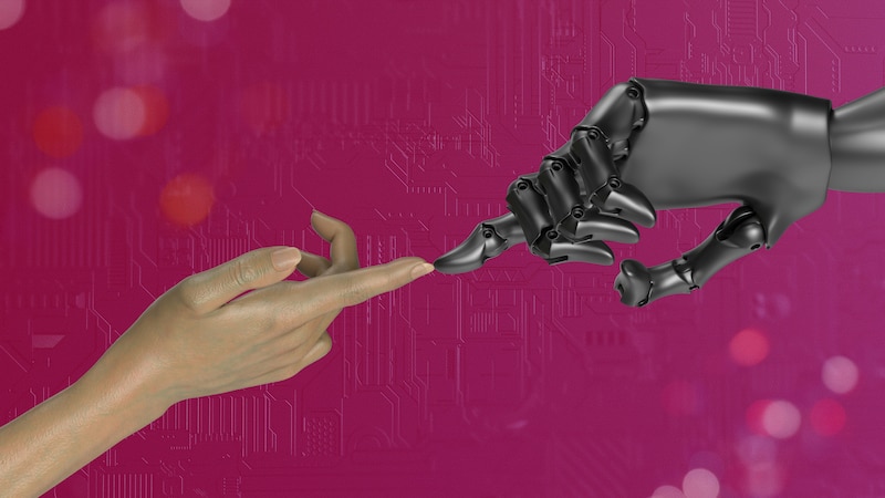 La mano del robot toca la mano humana